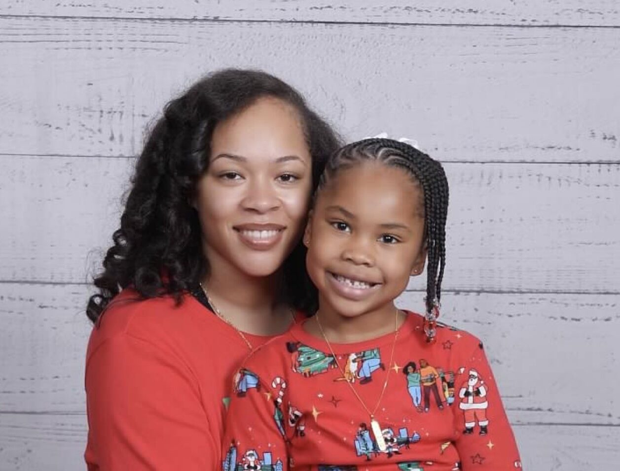 mom and daughter smiling