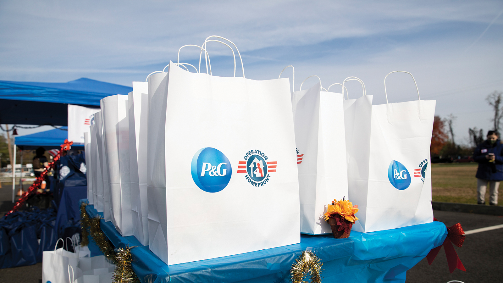 Image of bags of holiday meals on a table.