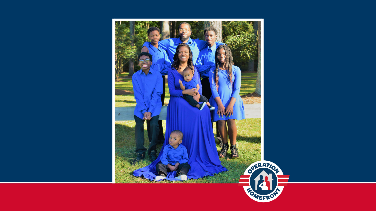 family in matching blue outfits