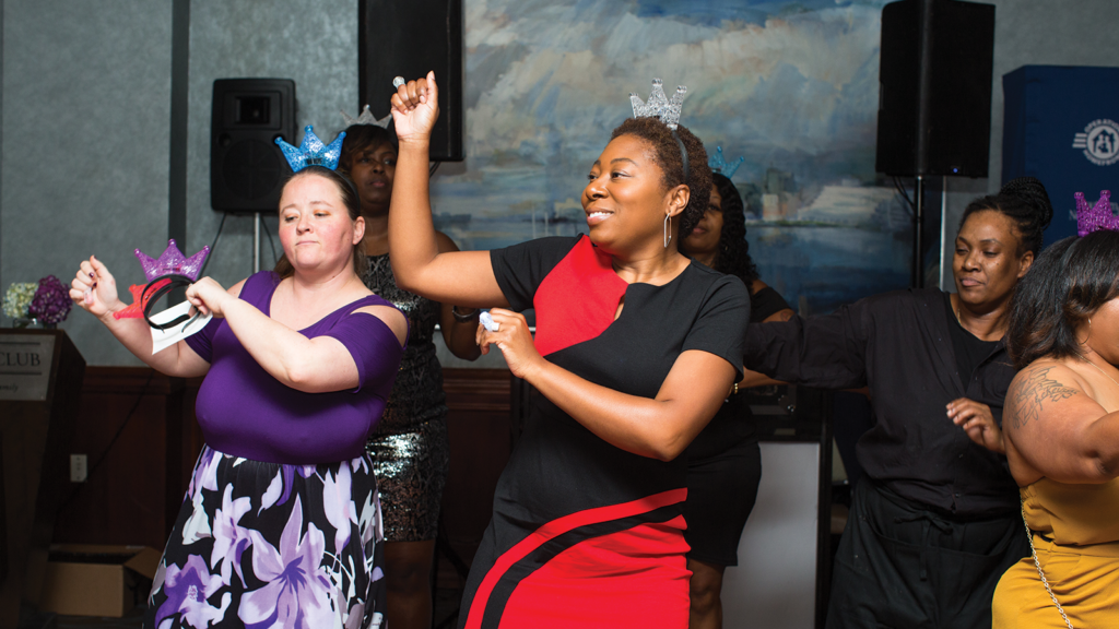 Military spouses dancing at homefront celebration